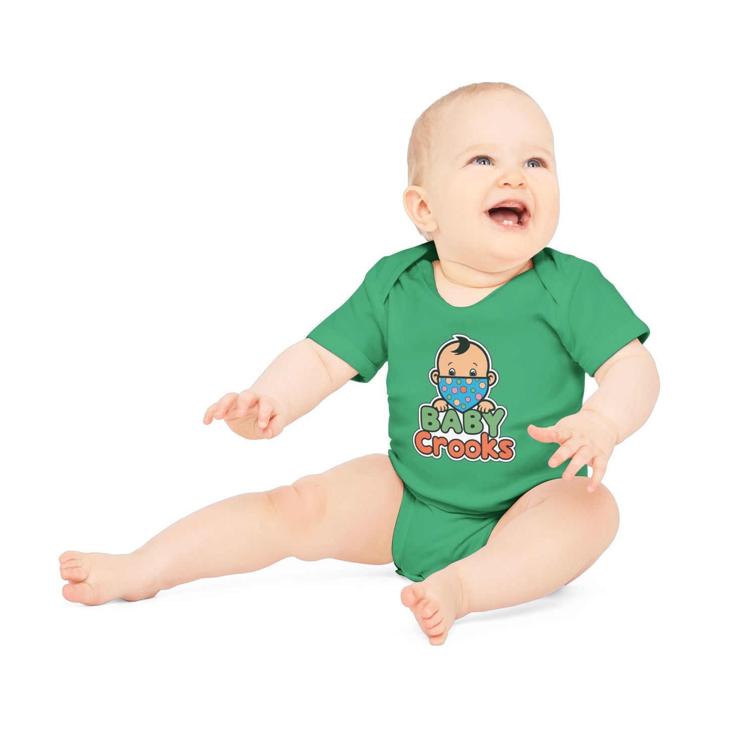 Baby wearing a green onesie with 'Baby Crooks' print on a white background